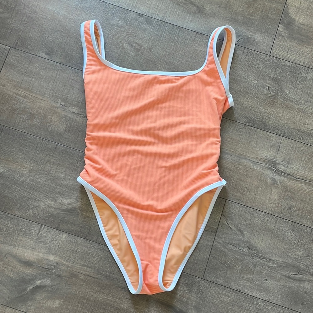 Lainsnow swimsuit worn once, professionally cleaned. Sz Large, in Cantaloupe.